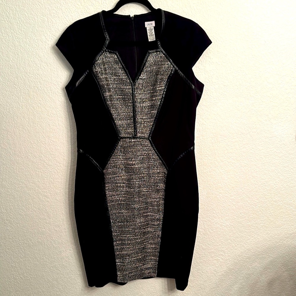 Cache, size 14, blank dress with white and silver inlay and faux leather trim.